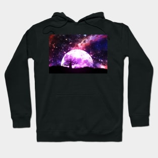 Lone tree over rising pink moon Hoodie